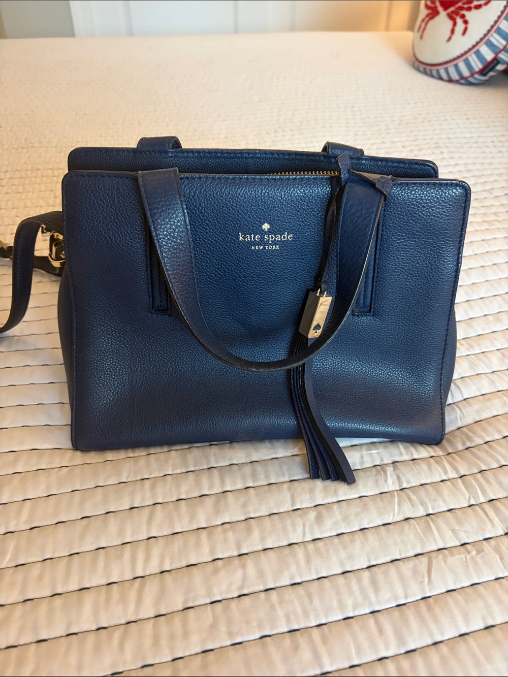 kate spade navy leather satchel with tassel and gold hardware